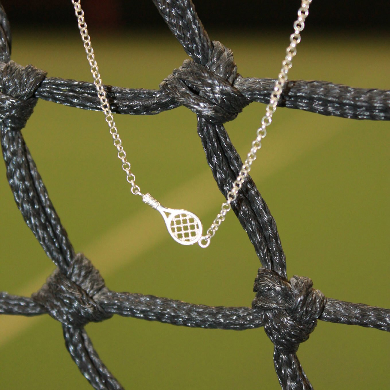 Silver tennis racket necklace "Meet your match"